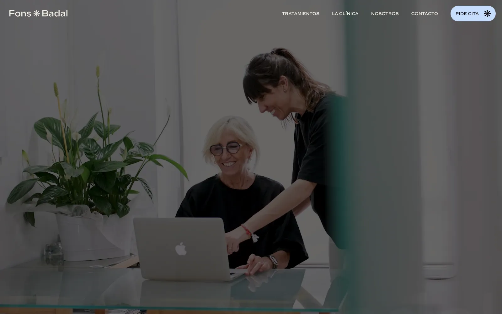 The new Fons Badal home page: two of the clinic’s staff at a laptop