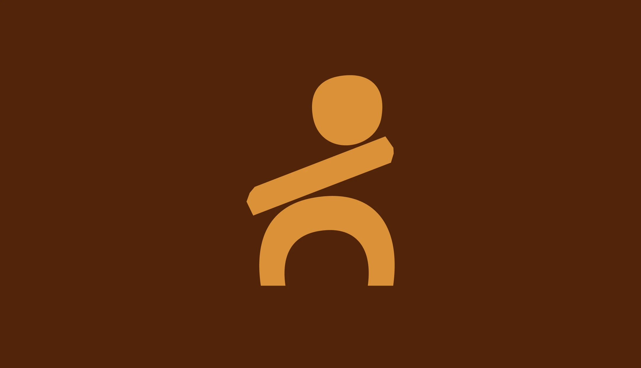 The Cor de Suro symbol in ochre on brown